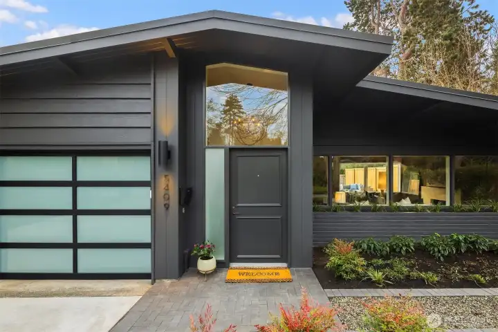 Notice the classic deep eaves, the clerestory window and level entry- signature Mid Century elements.