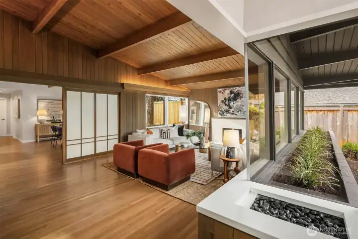 Sleek design with functional planter showcasing the indoor outdoor connection throughout the home.