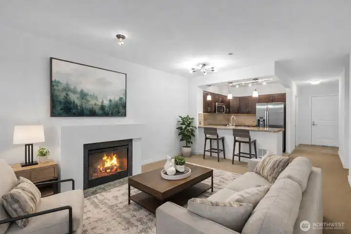 Warm & cozy gas fireplace.  Virtually staged.