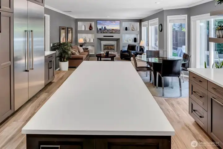 The newly remodeled kitchen w/heated floors, abundant storage and a SS, Thermador side by side, professional, built-in fridge/freezer. The kitchen flows perfectly into a dining nook w/slider to the backyard entertaining patio + custom deck. The great room w/stunning gas fireplace, mantle and lighted built-in wall is the heart of the home w/nature views, private and perfect. The newly remodeled kitchen w/heated floors, abundant storage and a SS, Thermador side by side, professional, built-in fridge/freezer. The kitchen flows perfectly into a dining nook w/slider to the backyard entertaining patio + custom deck. The great room w/stunning gas fireplace, mantle and lighted built-in wall is the heart of the home w/nature views, private and perfect.