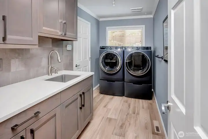 Mudroom + Laundry w/front loading Washer+Dryer. Mudroom + Laundry w/front loading Washer+Dryer.