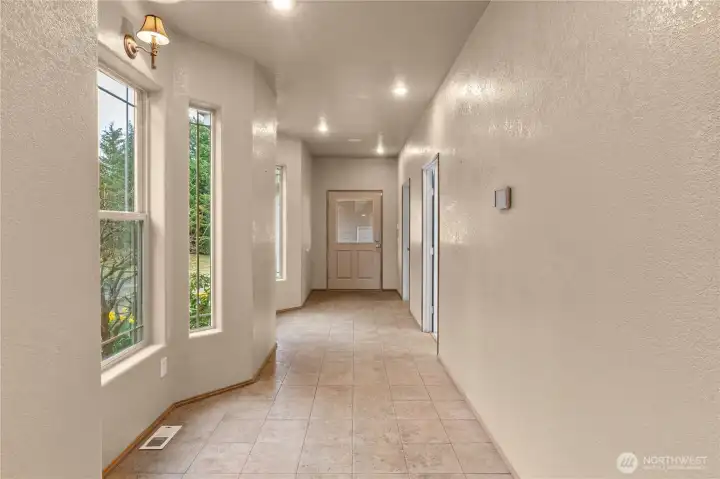 Hallway to 3rd bedroom and laundry room