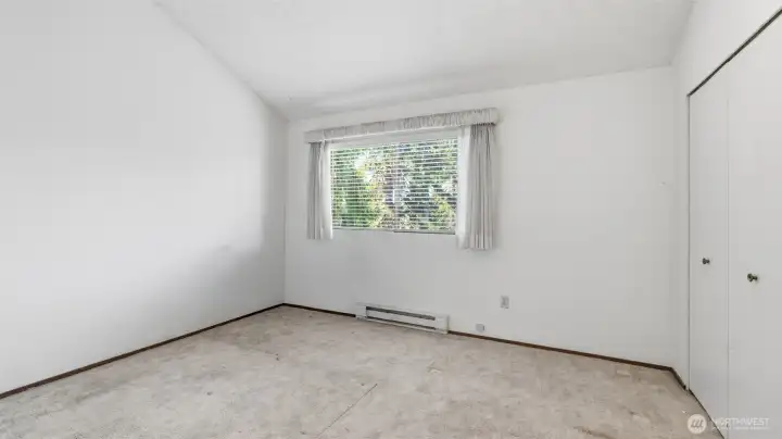 2nd bedroom with vaulted ceilings
