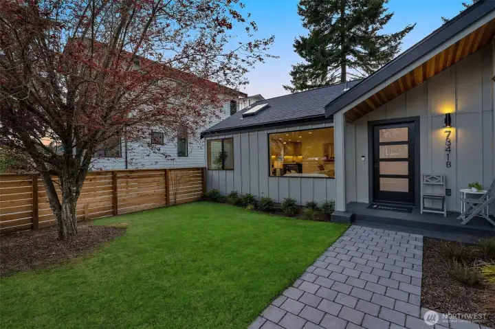 Fully fenced front yard.