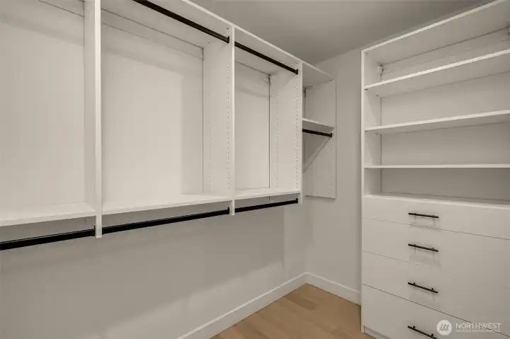 Primary walk-in closet.