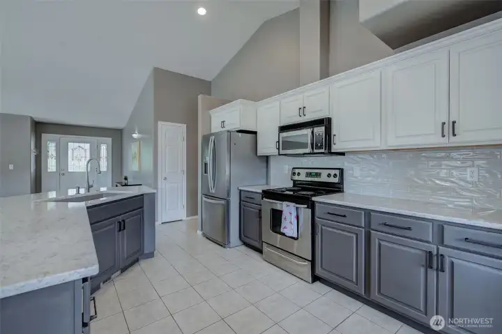 Beautifully updated kitchen with generous prep space and functional layout for everyday living. Beautifully updated kitchen with generous prep space and functional layout for everyday living.