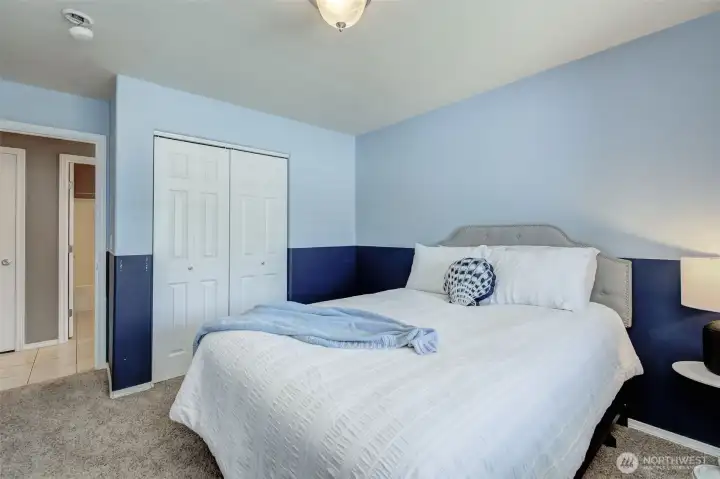 Bright guest bedroom with functional layout and convenient main-level location. Bright guest bedroom with functional layout and convenient main-level location.