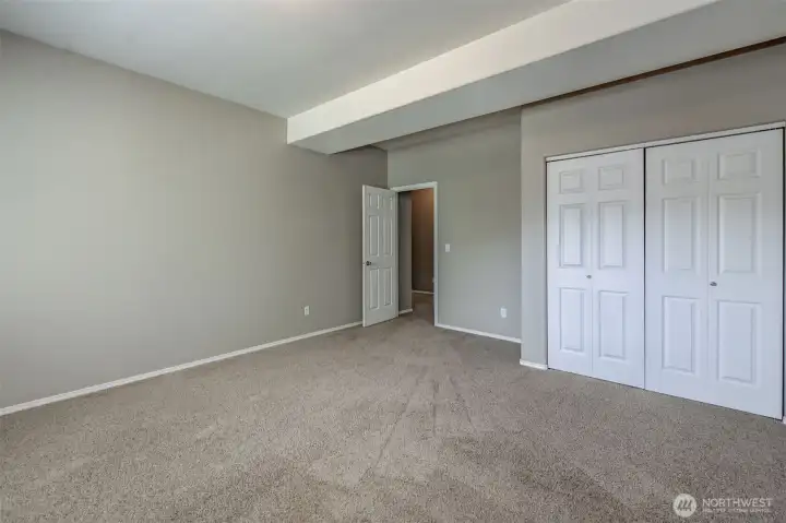 Comfortable lower-level bedroom with natural light and convenient access to living spaces. Comfortable lower-level bedroom with natural light and convenient access to living spaces.