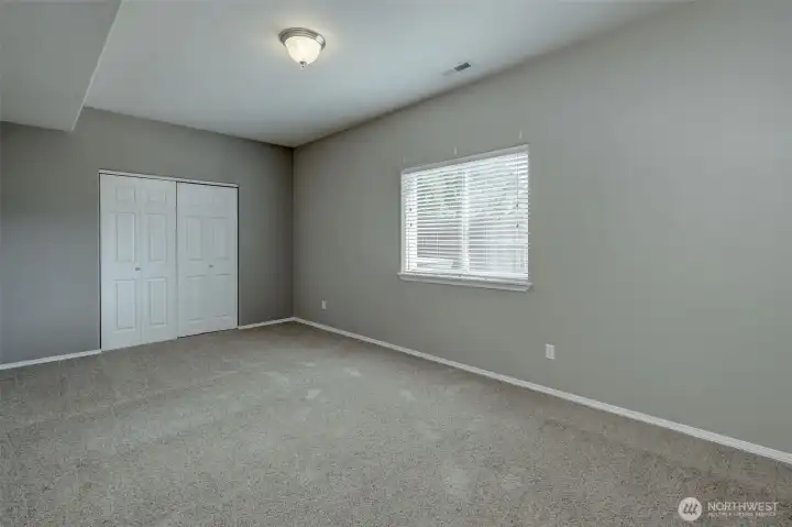 Spacious fourth bedroom with versatility for guests or home office use. Spacious fourth bedroom with versatility for guests or home office use.
