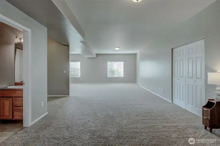 Lower level offering flexible living space ideal for recreation or gatherings. Lower level offering flexible living space ideal for recreation or gatherings.