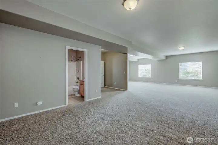 Oversized family room with abundant storage and direct access to outdoor living spaces. Oversized family room with abundant storage and direct access to outdoor living spaces.