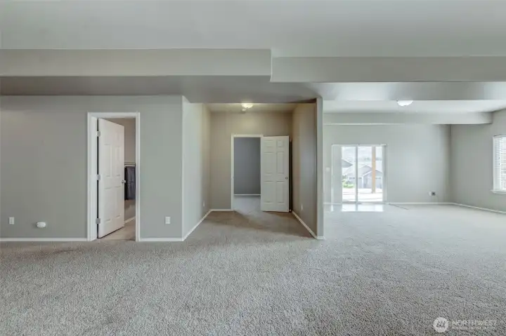Spacious lower level designed for entertaining, guests, or multigenerational living. Spacious lower level designed for entertaining, guests, or multigenerational living.