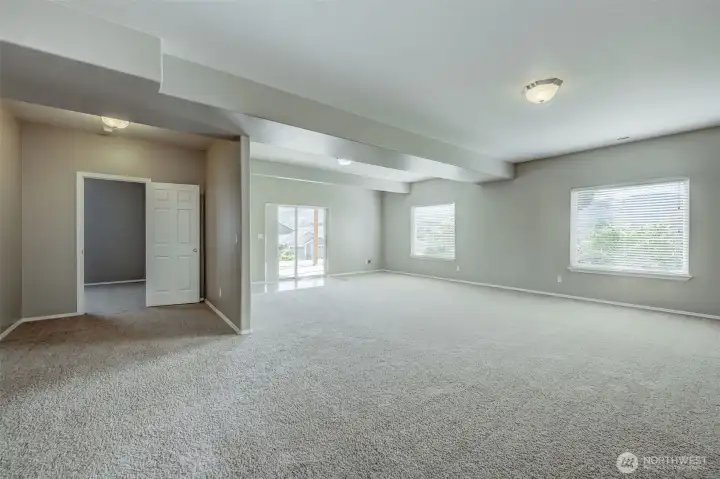 Large downstairs family room with plenty of room for movies, games, and relaxation. Large downstairs family room with plenty of room for movies, games, and relaxation.