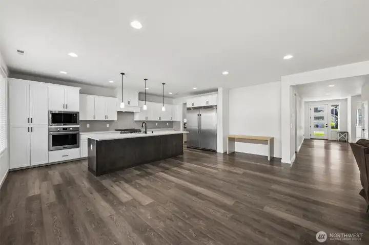 Spacious open-concept gourmet kitchen.