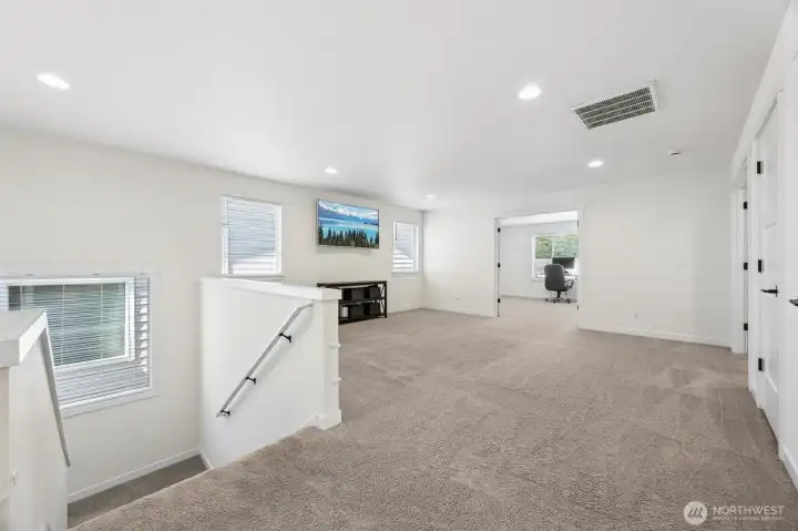 Versatile upstairs family room.