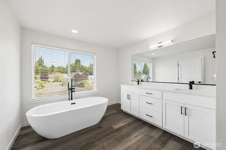 Freestanding tub takes center stage.