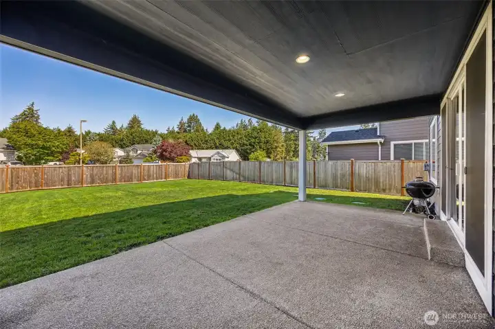 Covered patio for year-round enjoyment.