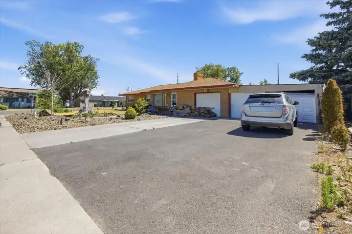 2 car garage on Right side of house is not permitted and is a current/open code violation with the City of Kennewick. Garage will need to be removed after close. 2 car garage on Right side of house is not permitted and is a current/open code violation with the City of Kennewick. Garage will need to be removed after close.