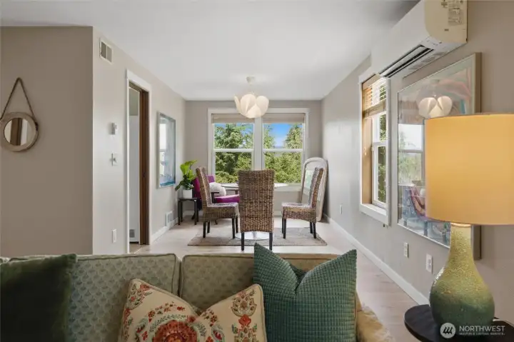 The second main floor living spaces large windows could be dining/play room, etc The second main floor living spaces large windows could be dining/play room, etc