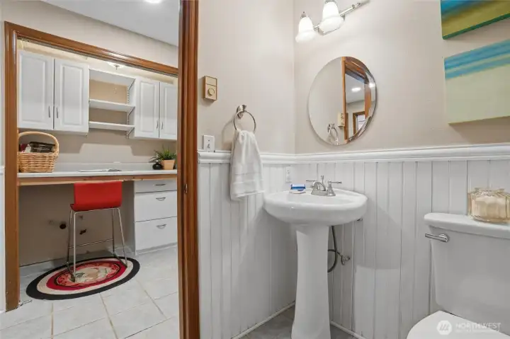 Powder room bath and laundry space Powder room bath and laundry space