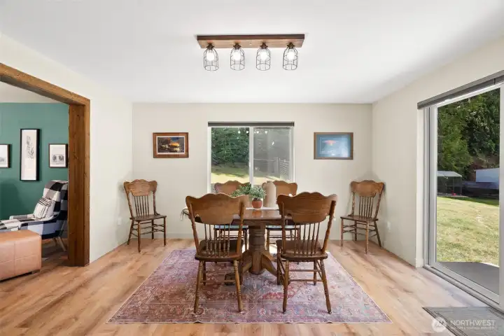 The large dining space flows from the kitchen, to the back yard with ease. The large dining space flows from the kitchen, to the back yard with ease.