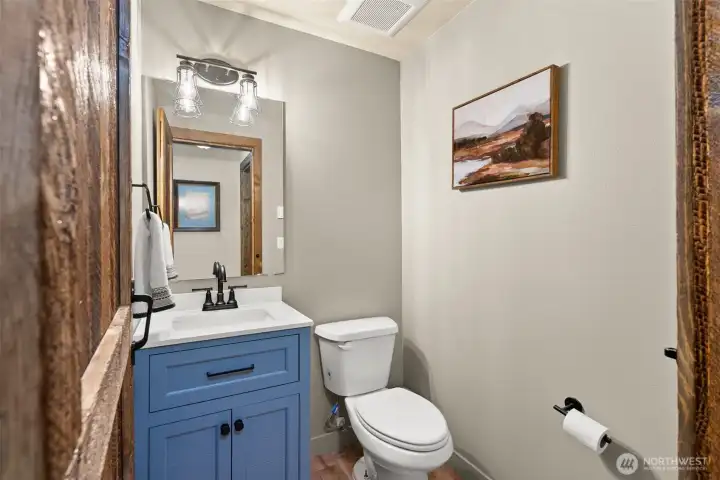 The main floor half bath offers comfort and ease for both family and guests. The main floor half bath offers comfort and ease for both family and guests.