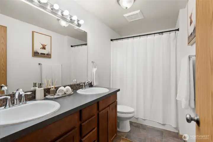 The primary bedroom ensuite features a double vanity. The primary bedroom ensuite features a double vanity.
