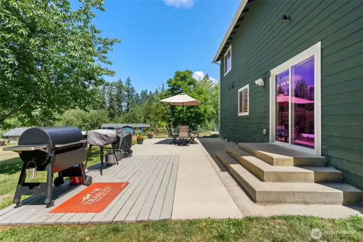 The large patio overlooking the massive yard is a place to relax, unwind, and watch the day go by. The large patio overlooking the massive yard is a place to relax, unwind, and watch the day go by.