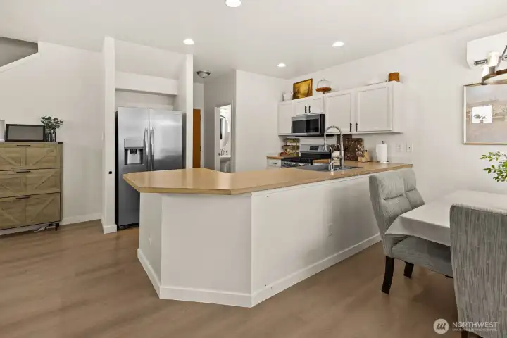 Spacious kitchen with stainless appliances, fresh paint, new luxury vinyl plank flooring, Spacious kitchen with stainless appliances, fresh paint, new luxury vinyl plank flooring,