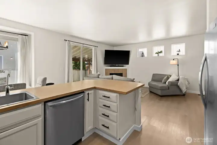 Kitchen looks out to dining and living room Kitchen looks out to dining and living room