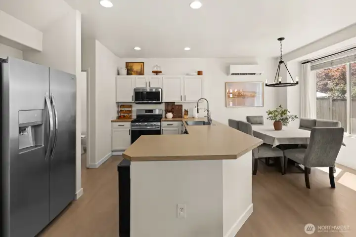 Updated lighting, paint, flooring and a such a bright kitchen Updated lighting, paint, flooring and a such a bright kitchen