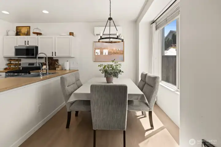 Dining room and island with room for chairs Dining room and island with room for chairs