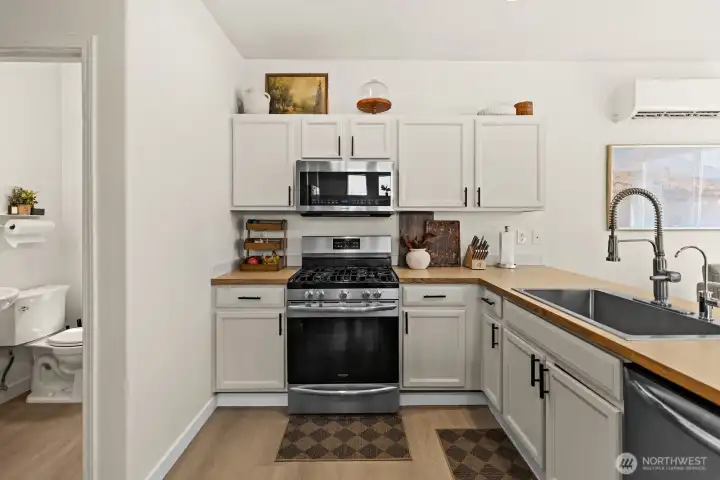 Half bath on the main and spacious, open concept kitchen Half bath on the main and spacious, open concept kitchen