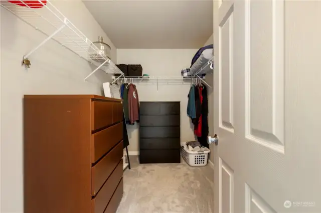 primary walk-in closet offers lots of space.