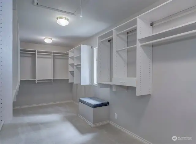 HUGE Walk-In Closet With Attic Access Storage.