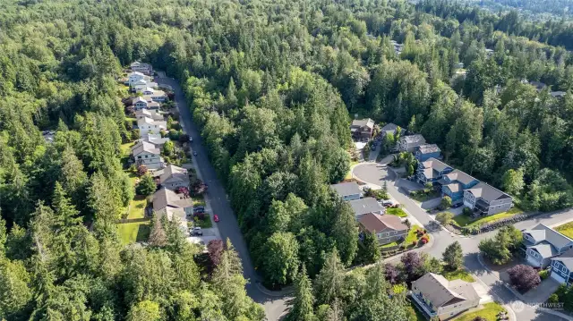 1303 Parkstone Ln, Bellingham, WA.  Just 5 min east of I-5, off Lakeway Dr.  The forested 7.34 ac parcel is in the center of the photo.