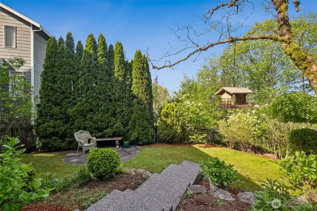 Such a beautiful spot to enjoy the birds, the fragrant bushes, and watching your fruit trees come into bloom!