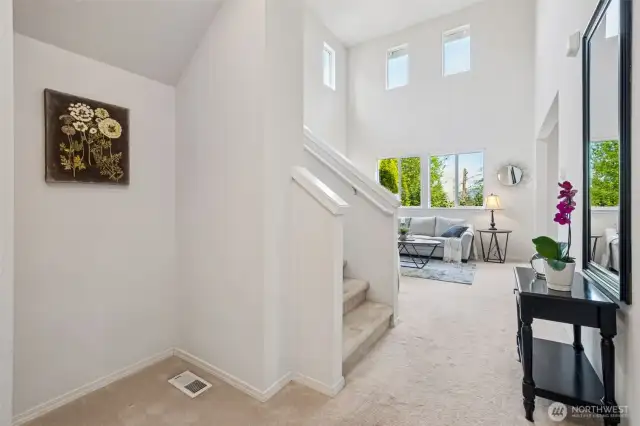 Gorgeous views, mature trees, bright windows welcome you!