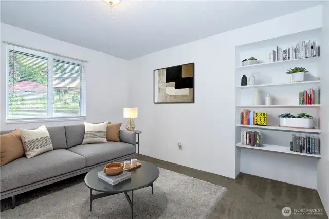 3rd bedroom staged as sitting room, could easily be a bedroom