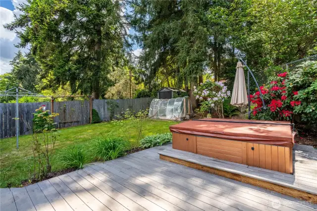 Mature landscaping plus green house.  Don't forget this parcel has RV parking too.