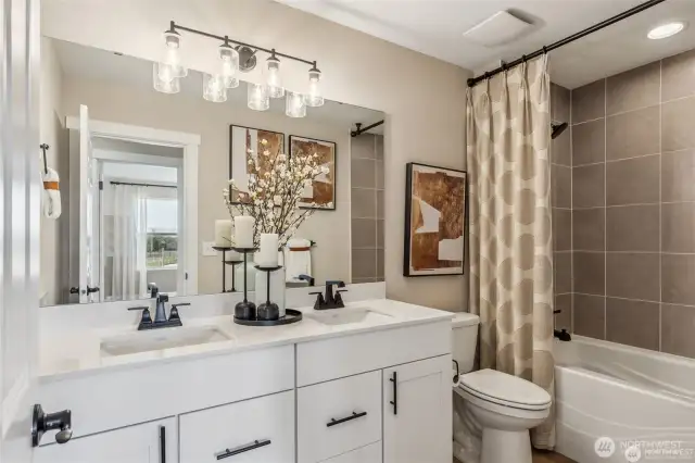 Photo from model home in same community - same floor plan but finishes may vary.