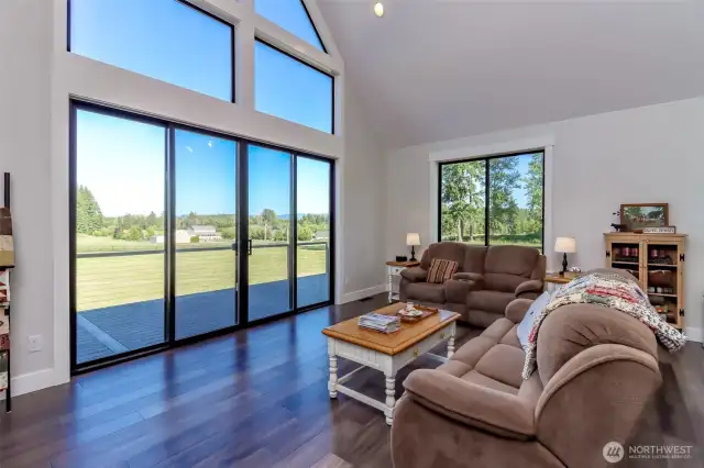 Vaulted ceiling and large windows to soak in the beauty.