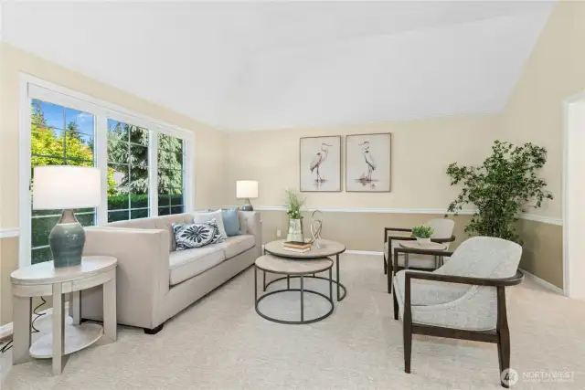 Formal living room off entry with new carpet in 2024.