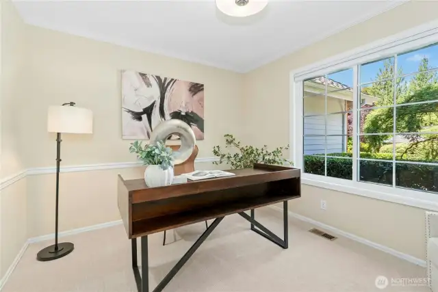 Main floor office with french doors.