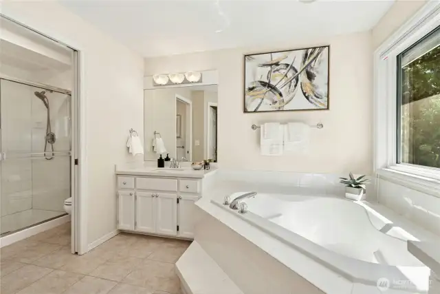 Separate water closet with shower.