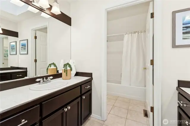 Up-stairs full bath for other 3 bedrooms w/ separate door for water closet and shower.