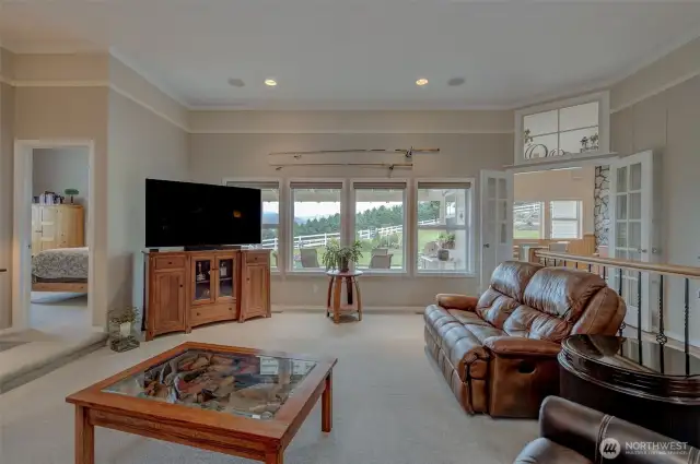 A peek toward the 3/4 bath & 3 beds..