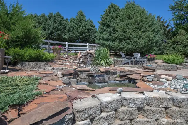Soothing water feature and sitting area.. The view from here is captivating!