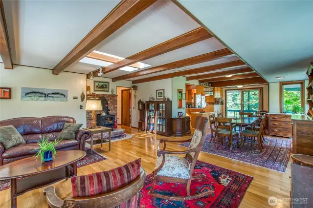 Open concept living with wood stove, pellet stove, and air conditioning for year a round comfort.