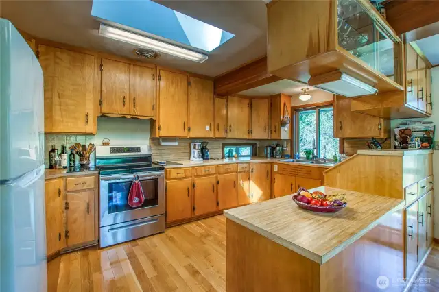 Lots for storage throughout the kitchen. Skylights open for added ventilation